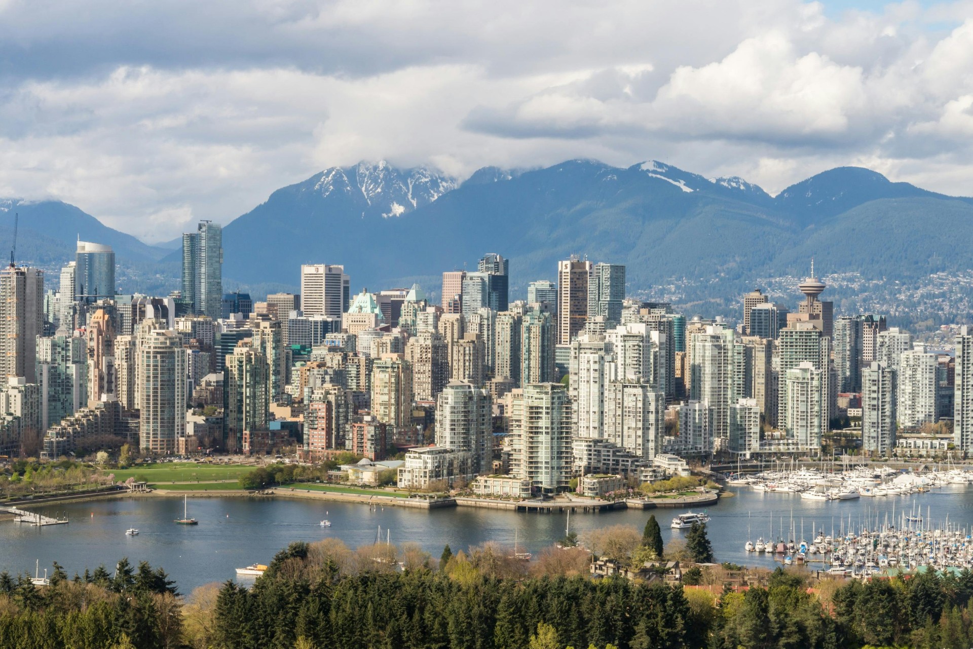 Cluster of multi-family residential towers in the Vancouver metropolitan skyline